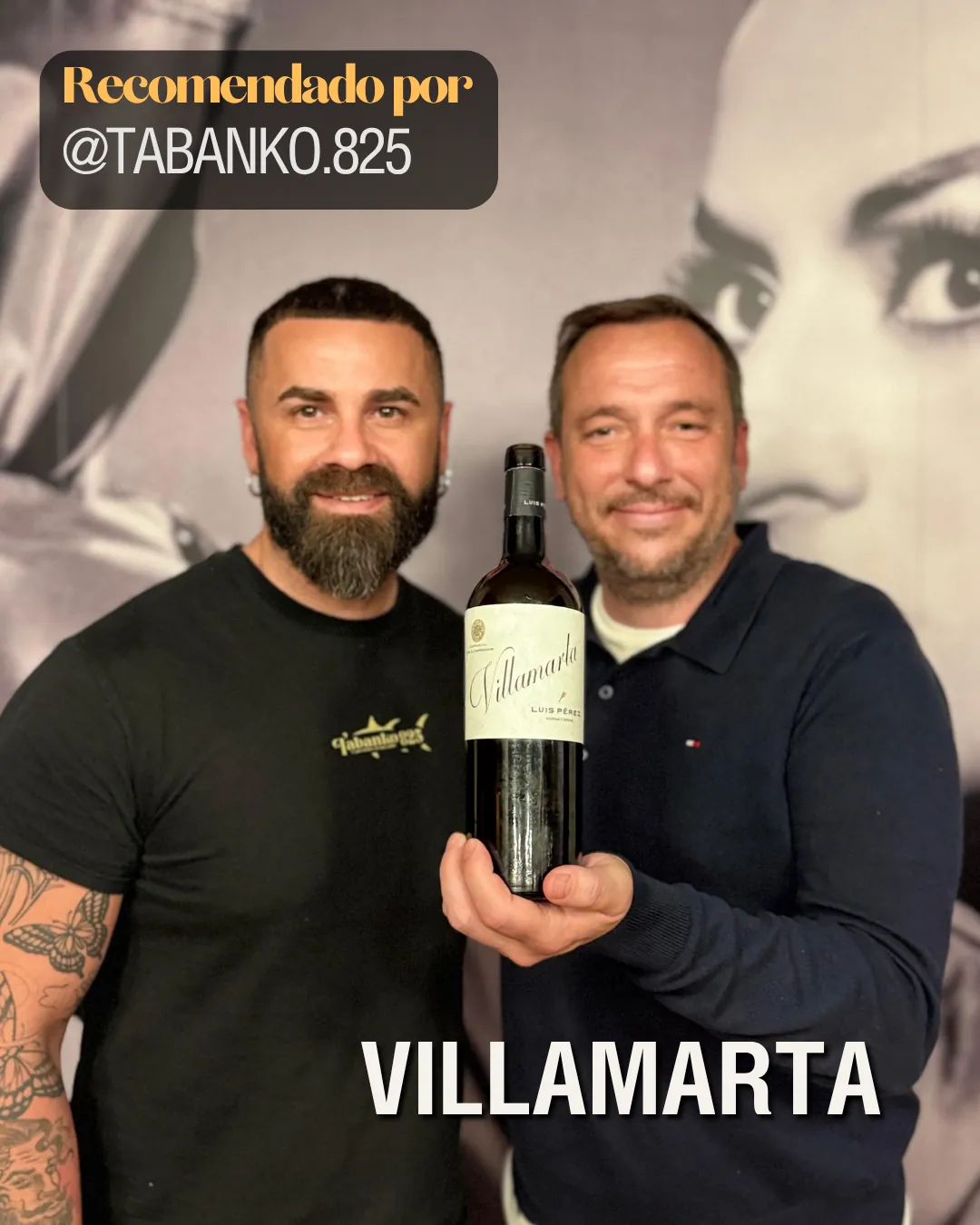 Pablo Teipro junto al propietario de Tabanko posando con una botella de vino tinto Villamarta