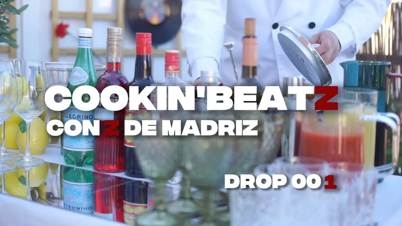 Plano estético y cinematográfico de la sesión Cookin' Beatz Drop 001, mostrando la fusión de música y cocina en una terraza urbana de Madrid